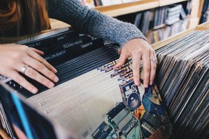 Girl record store shopping offline Facebook store visits